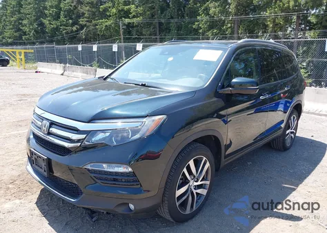 2016 Honda Pilot Touring z USA, uszkodzony, nr VIN 5FNYF6H95GB047558